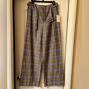 Brand new pair of plaid slacks. Brand is A New Day, size 10. Tag still in place.